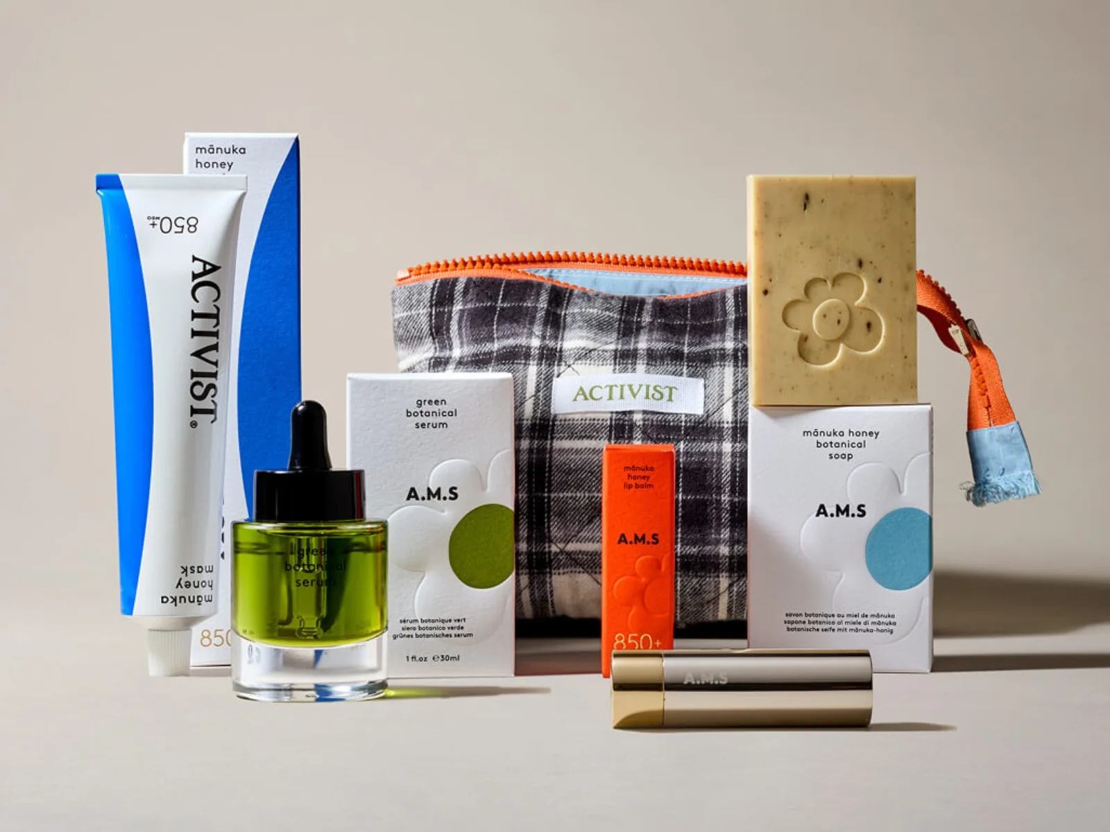 ACTIVIST Supernatural Skin Set displayed with Mānuka Honey Mask, Green Botanical Serum, Mānuka Honey Botanical Soap, lip balm, and handcrafted pouch arranged together on a neutral background.