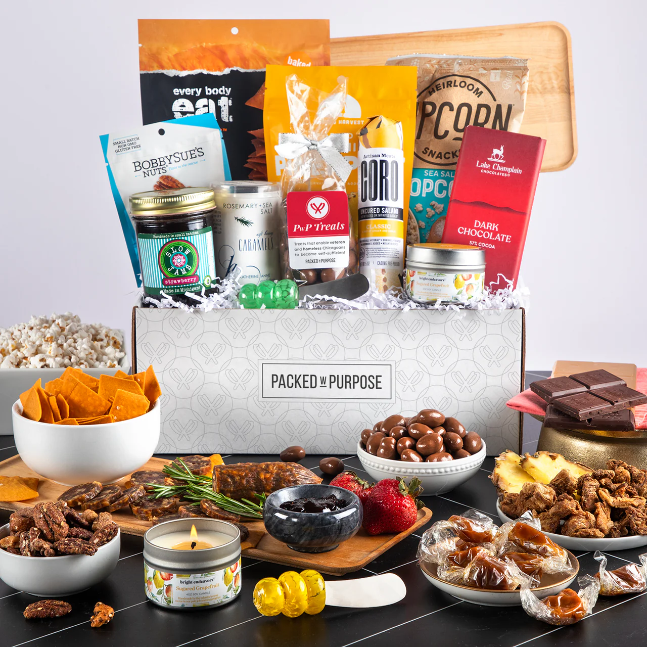 Housewarming & Closing Gift Guide: Deluxe Charcuterie Board Gift Basket from Packed with Purpose